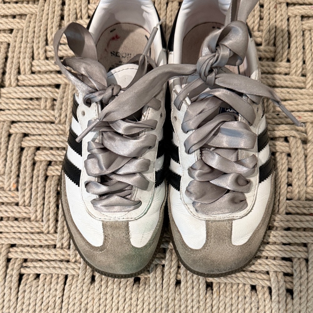 White and Gray Sneakers with Black Stripes